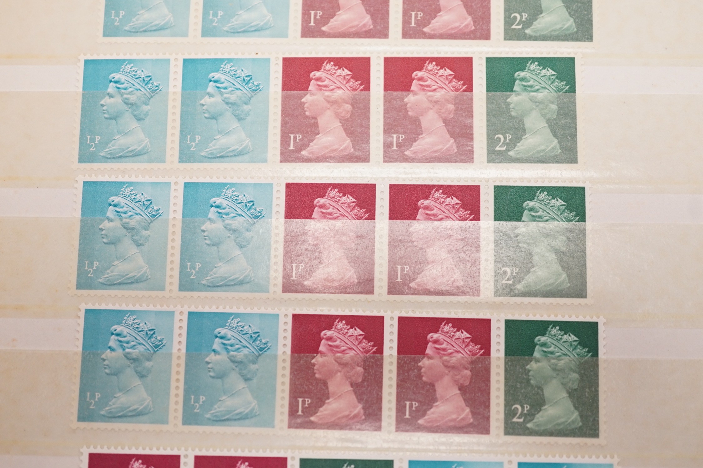 A box of Great Britain decimal mint presentation packs, FD covers, plus Channel Islands, Isle of Man in three albums, old approval books and loose